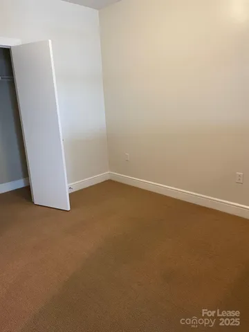 an empty room with a door