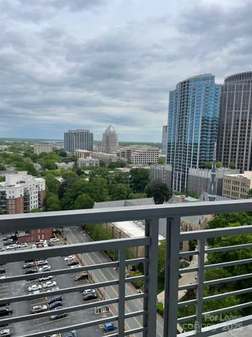 a view of city from a balcony
