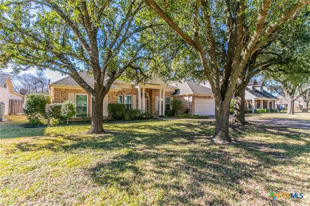 a picture of a bathroom with mirror