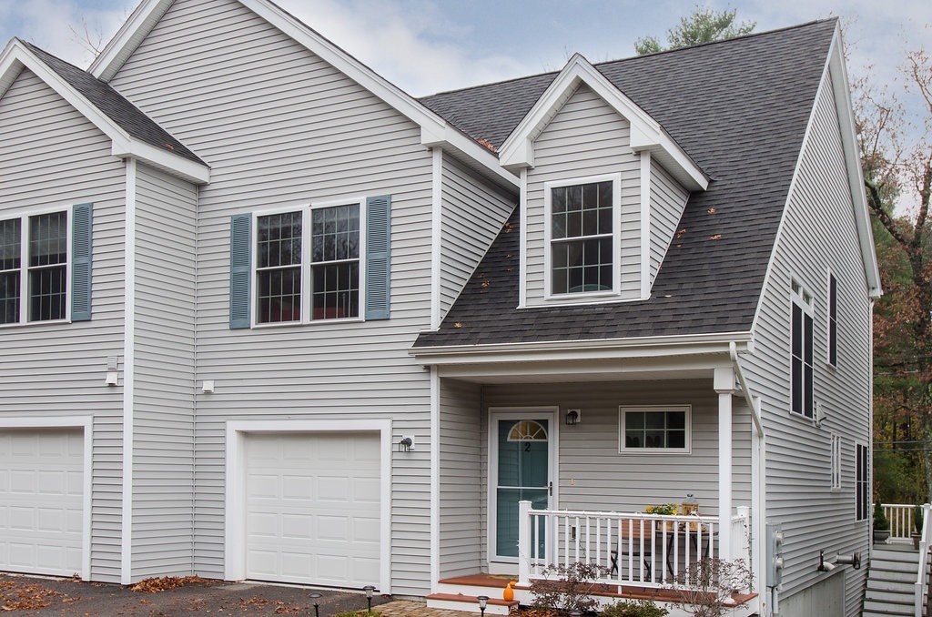 2 Sterling Lane, Unit 2 Walpole, MA 02081 - Photo 1 of 27 a front view of a house