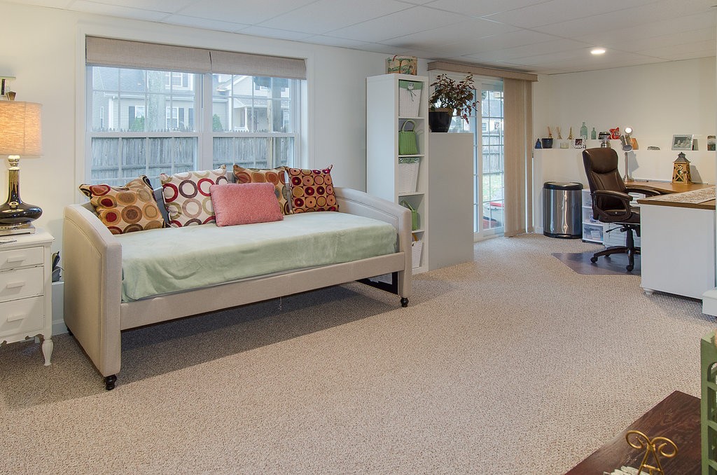 2 Sterling Lane, Unit 2 Walpole, MA 02081 - Photo 21 of 27 a bedroom with bed and window