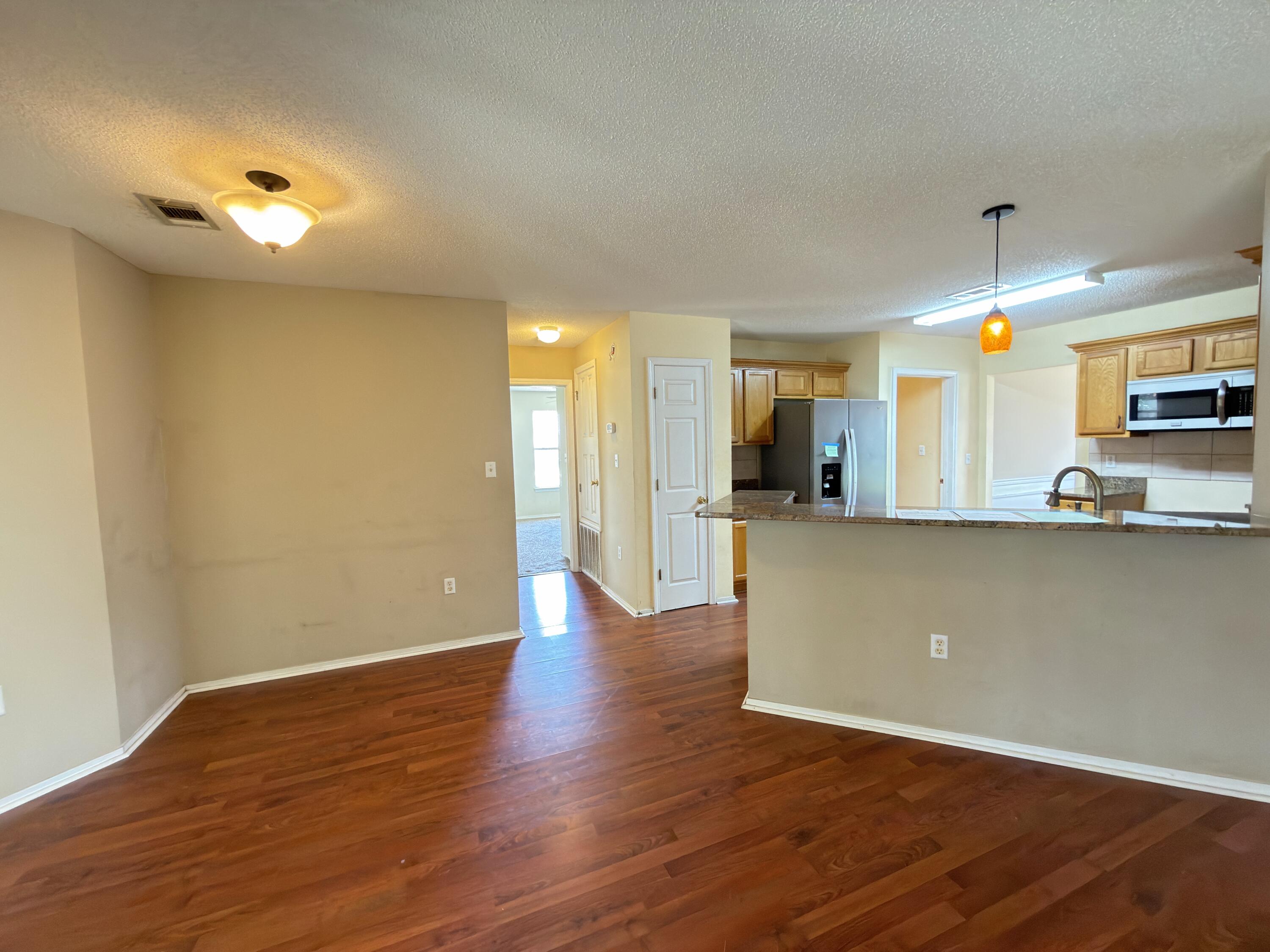 688 Brunson Street Crestview, FL 32536 - Photo 18 of 27 view of kitchen from living room