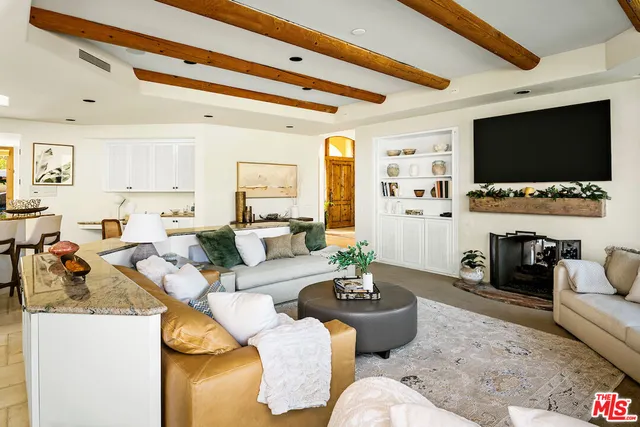 a kitchen with a table and chairs in it