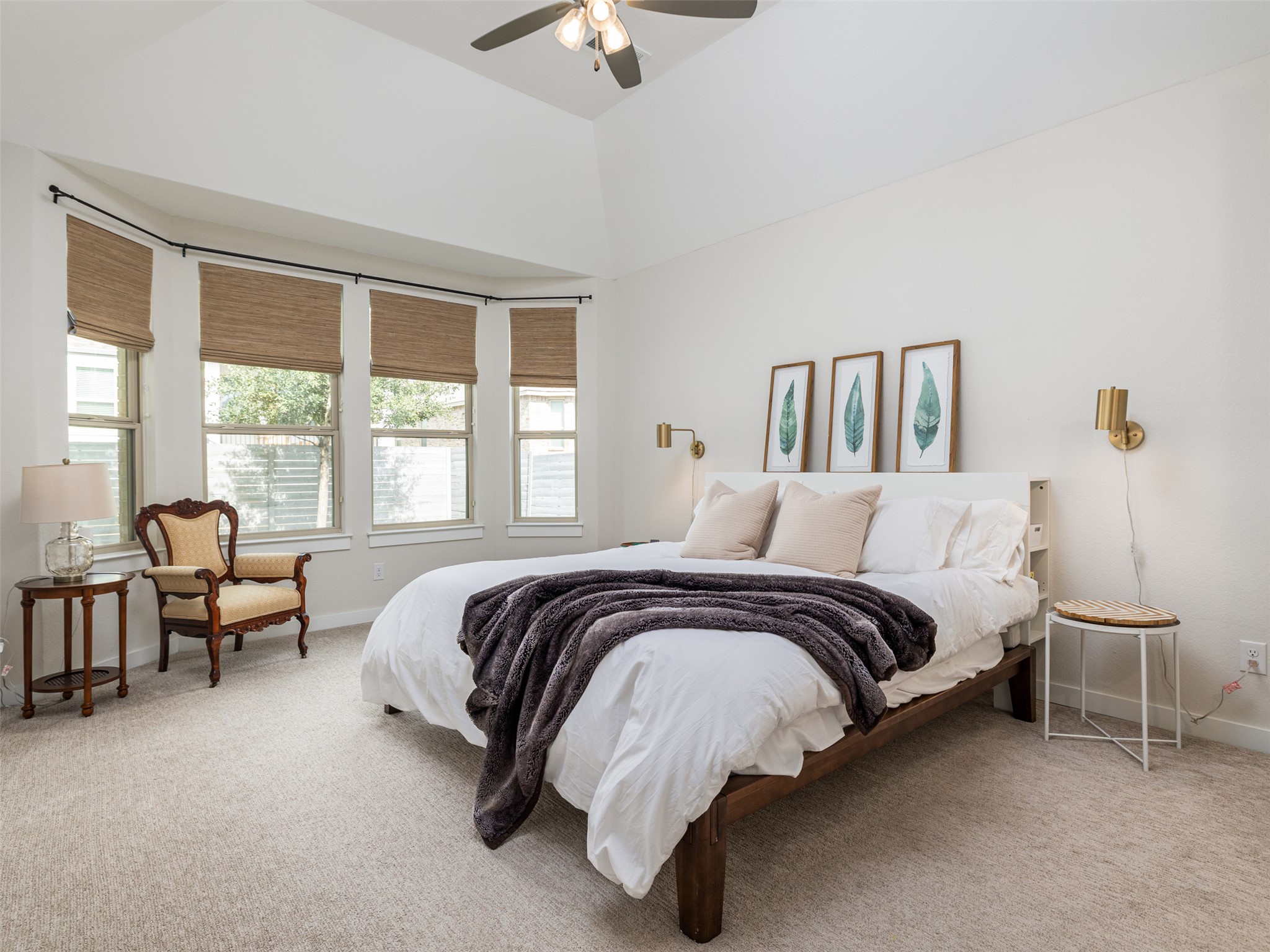 233 Arrowhead Mound Road Georgetown, TX 78628 - Photo 10 of 40 Bedroom featuring light colored carpet, multiple windows, and ceiling fan