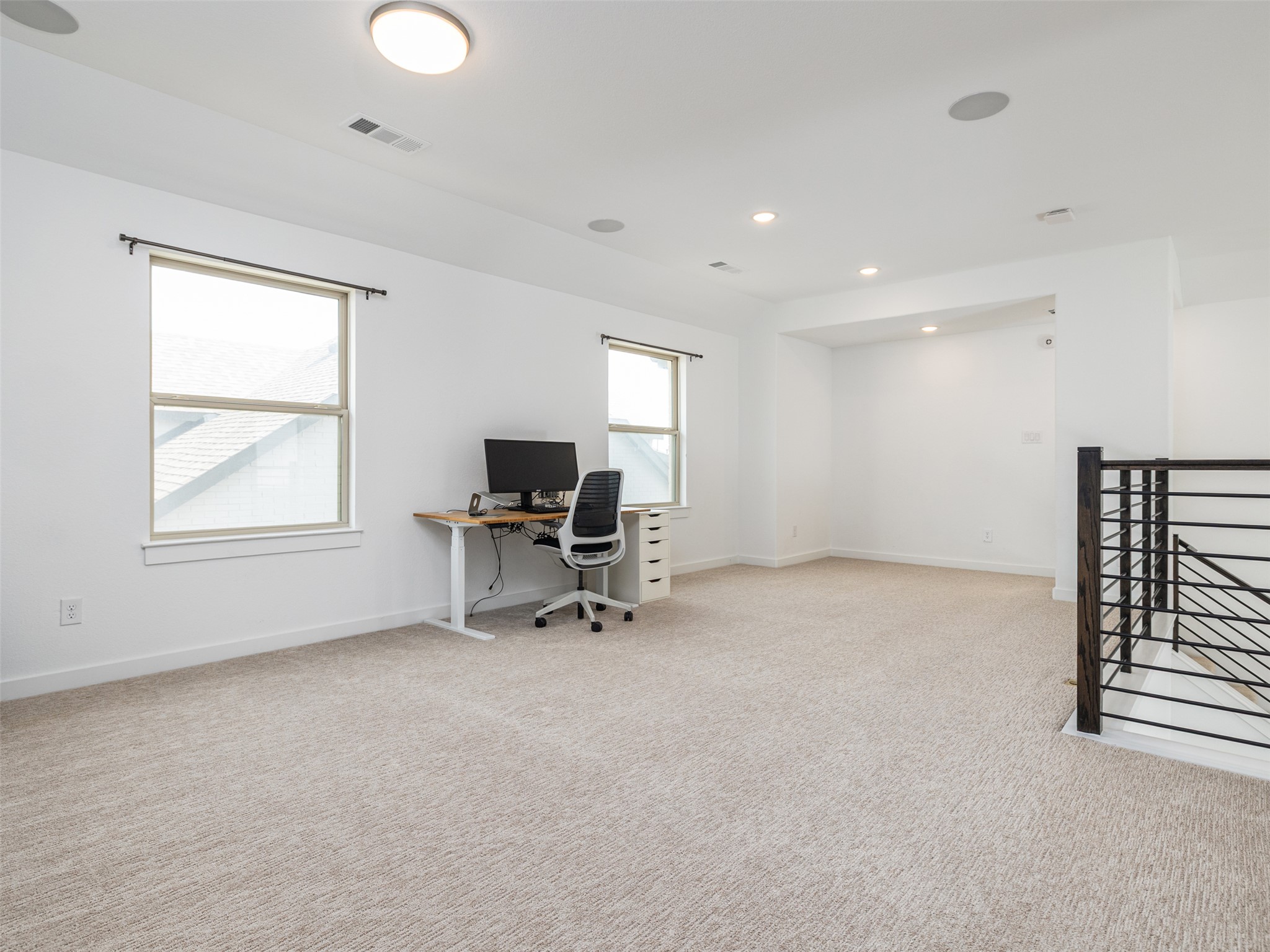 233 Arrowhead Mound Road Georgetown, TX 78628 - Photo 16 of 40 Office space featuring light carpet and recessed lighting