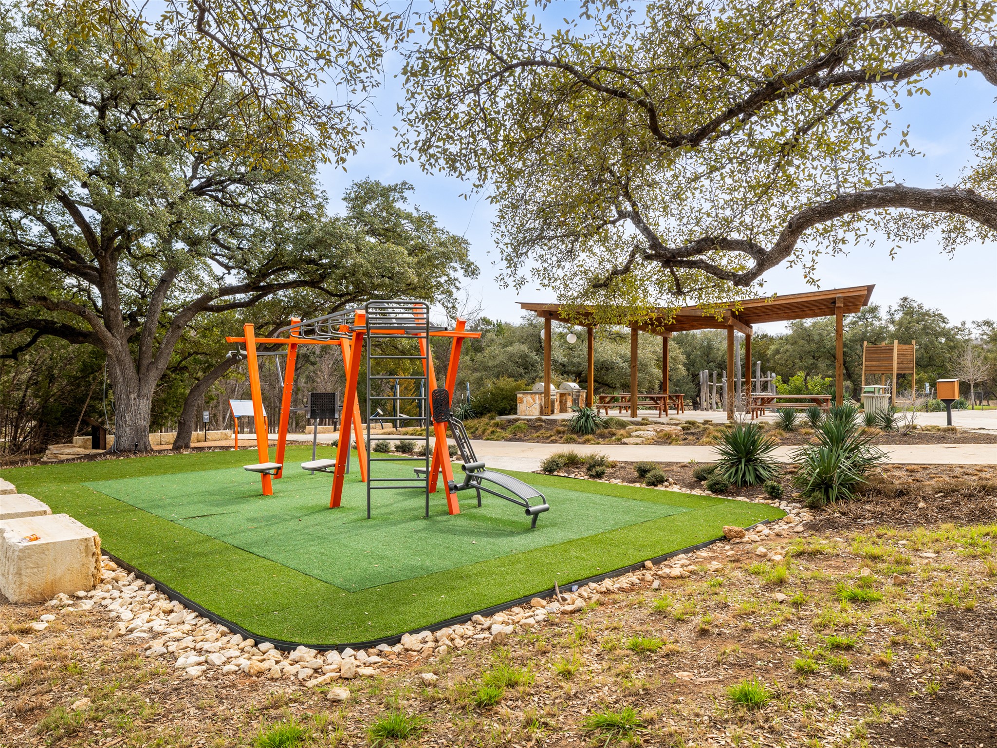 233 Arrowhead Mound Road Georgetown, TX 78628 - Photo 37 of 40 Community jungle gym featuring a patio area