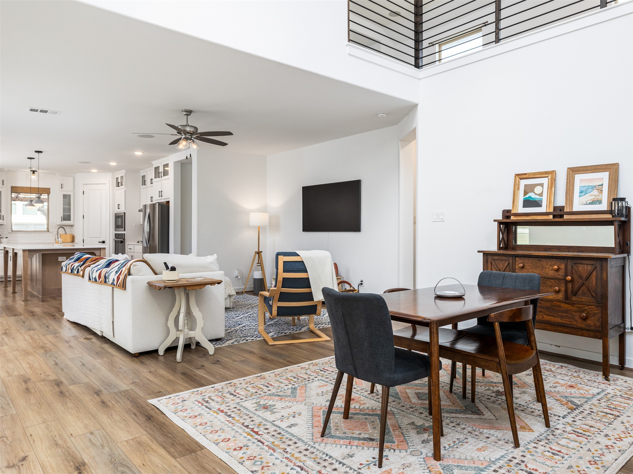 233 Arrowhead Mound Road Georgetown, TX 78628 - Photo 5 of 40 Dining room with light wood-type flooring, a ceiling fan, and recessed lighting