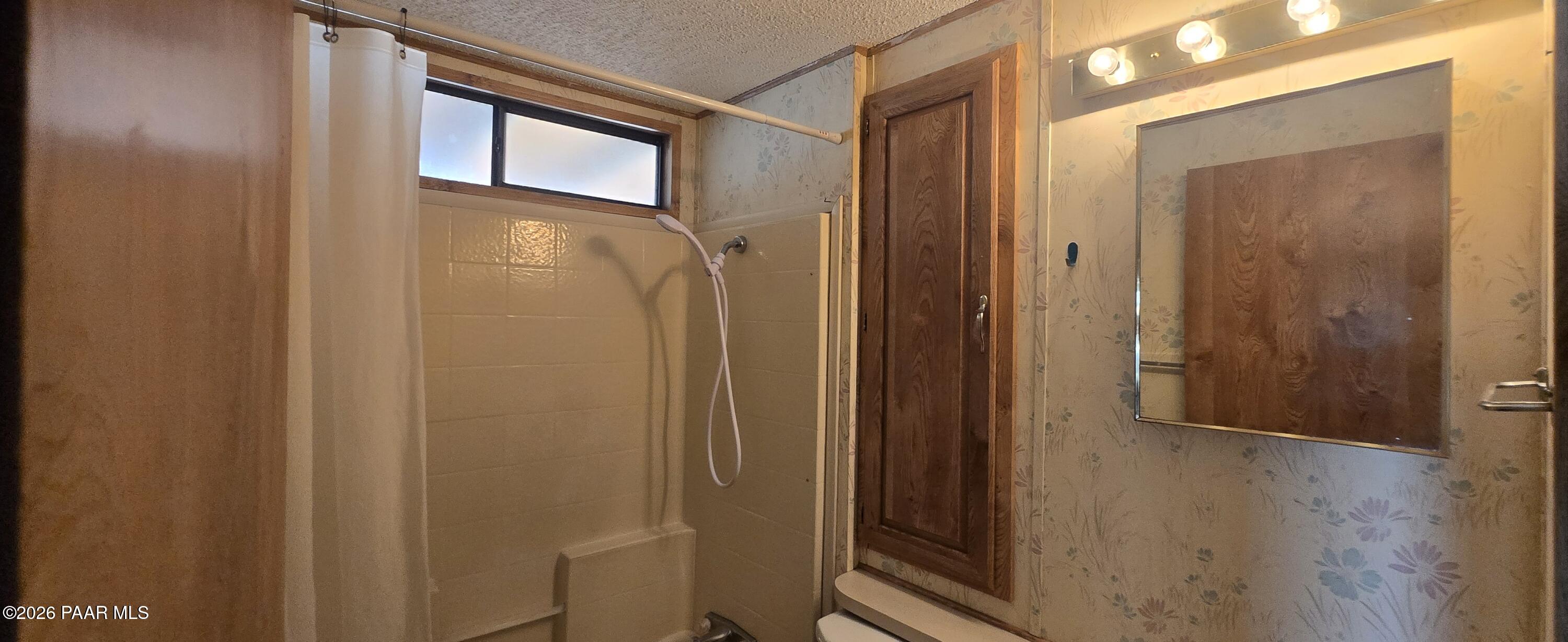 11250 East State Rte 69, Unit 61 Prescott Valley, AZ 86314 - Photo 11 of 41 a bathroom with a window