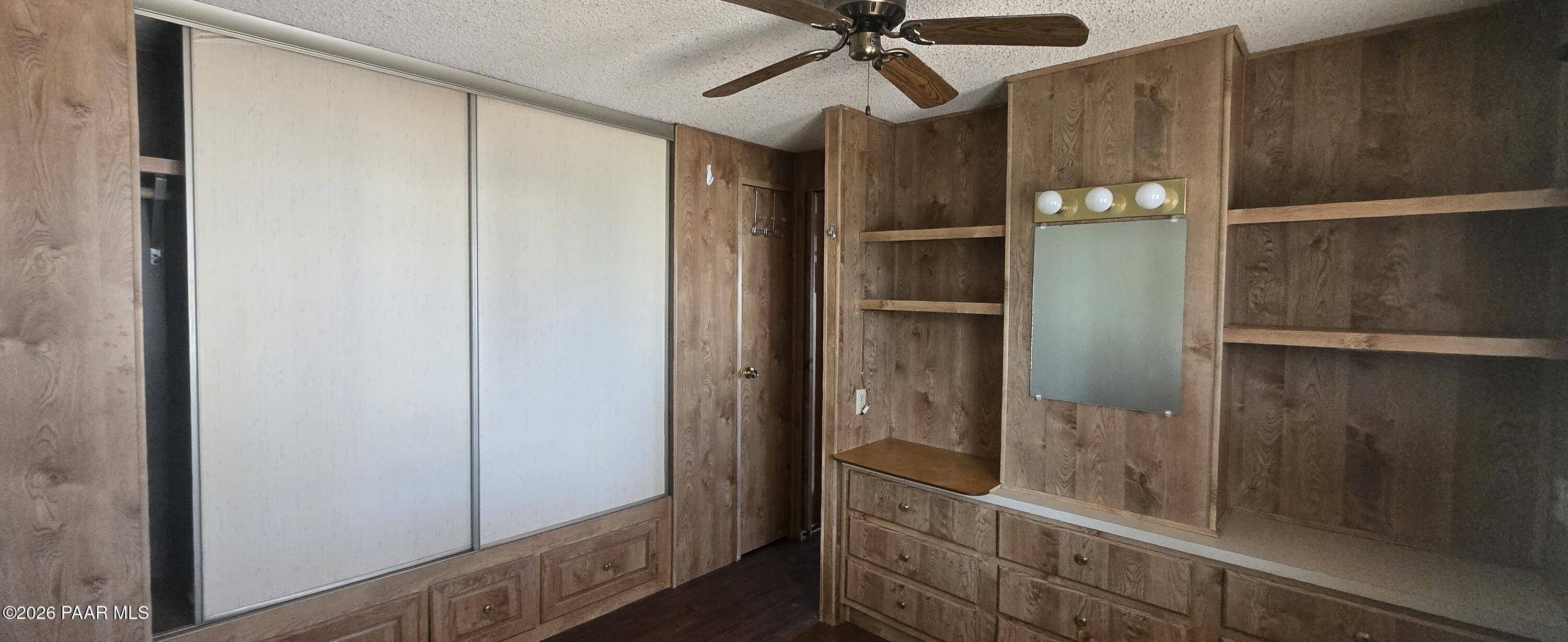 11250 East State Rte 69, Unit 61 Prescott Valley, AZ 86314 - Photo 15 of 41 a view of a hallway with a chandelier fan
