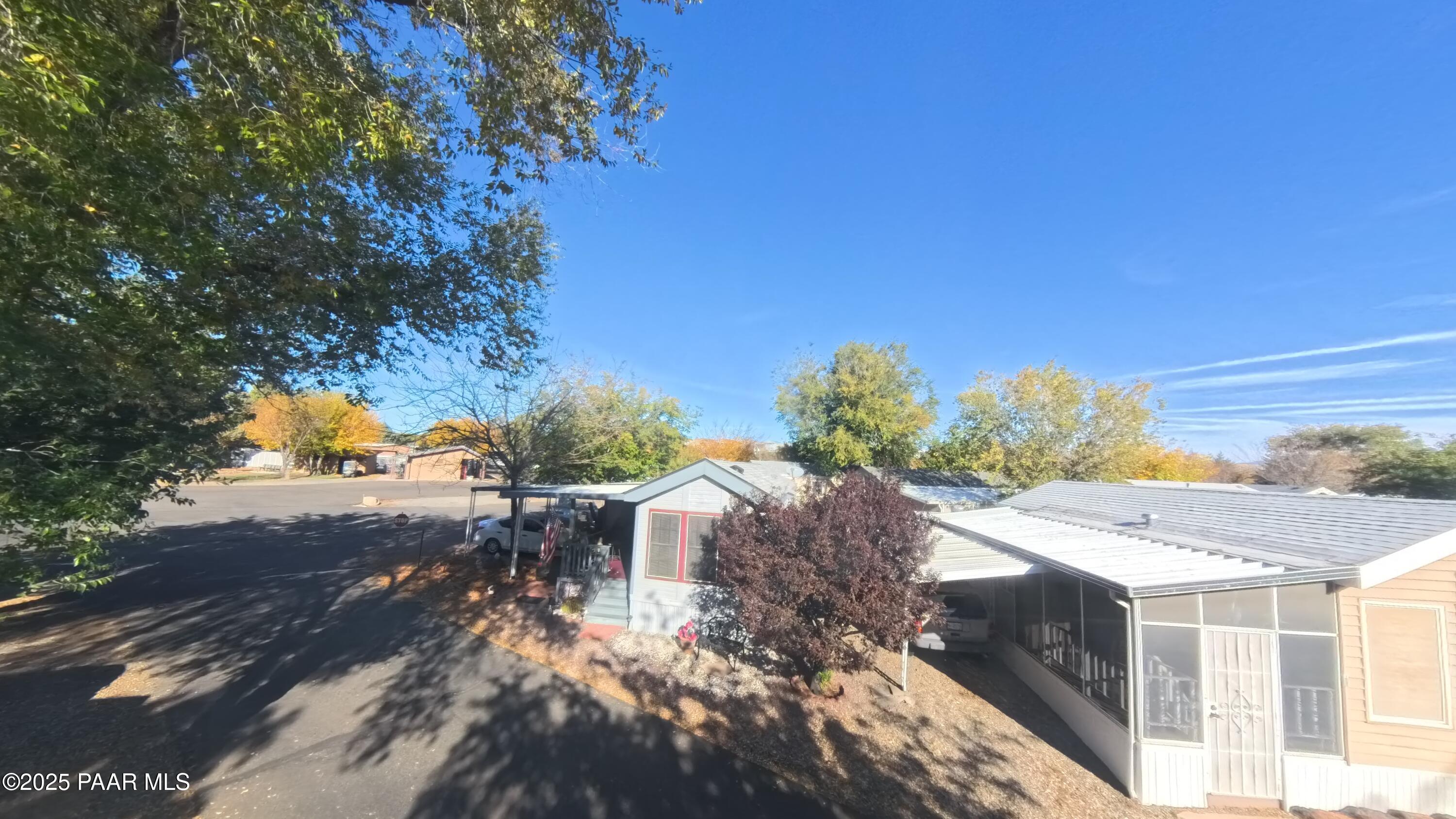 11250 East State Rte 69, Unit 61 Prescott Valley, AZ 86314 - Photo 23 of 41 a view of a terrace with a garden
