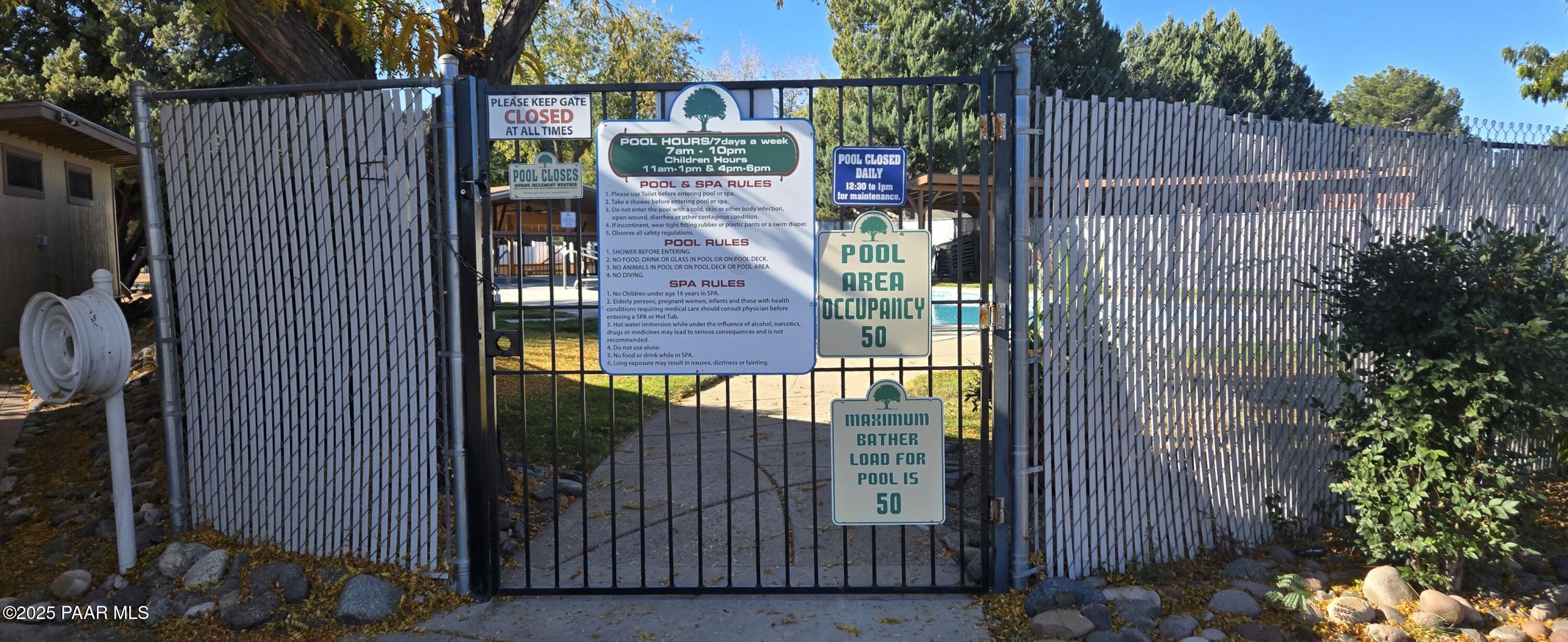 11250 East State Rte 69, Unit 61 Prescott Valley, AZ 86314 - Photo 38 of 41 a view of a house with a trees from a corridor