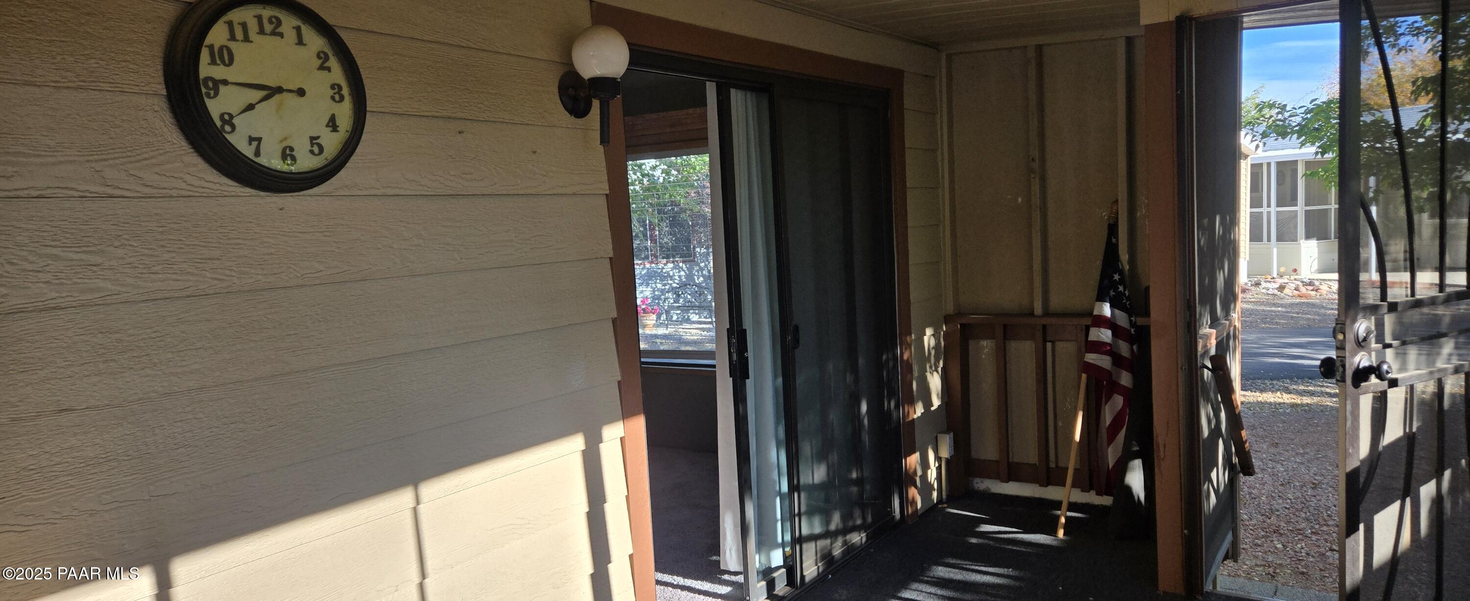 11250 East State Rte 69, Unit 61 Prescott Valley, AZ 86314 - Photo 4 of 41 a view of a hallway with wooden floor and a window