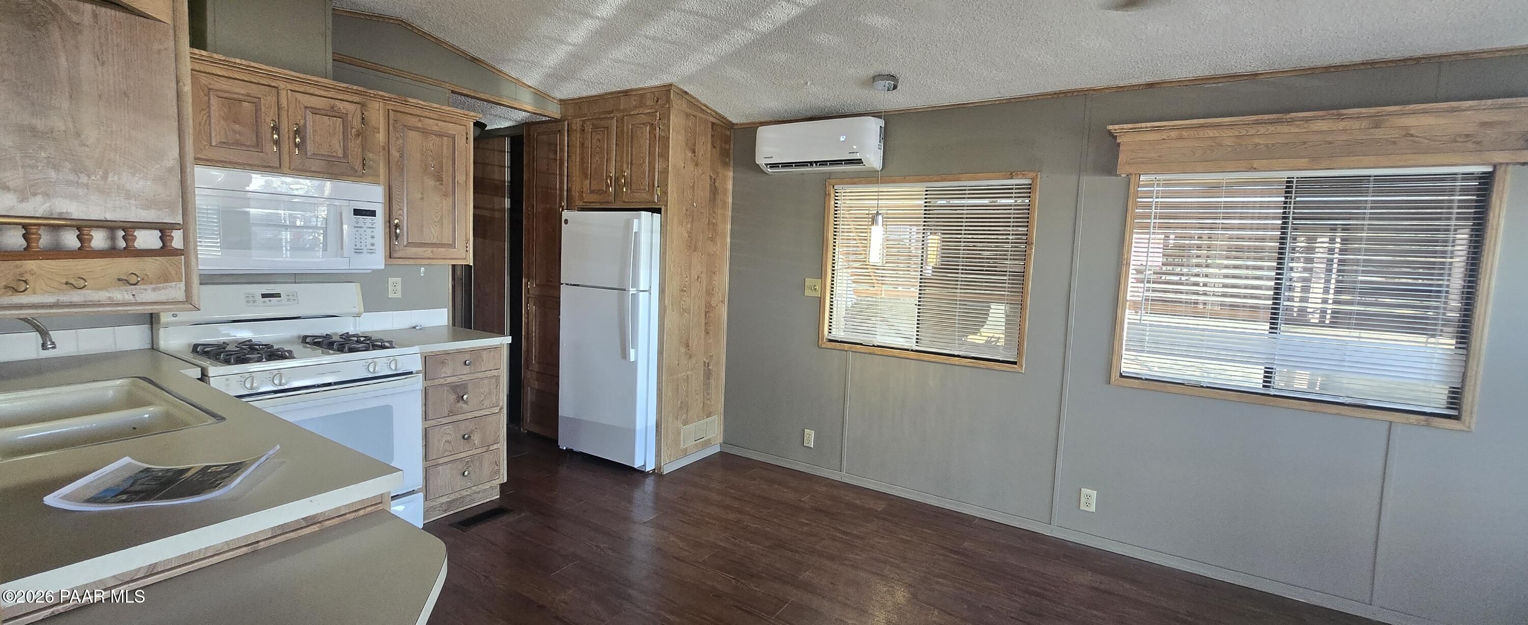 11250 East State Rte 69, Unit 61 Prescott Valley, AZ 86314 - Photo 5 of 41 a room with a bed and a window
