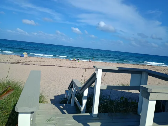 a view of an ocean from stairs