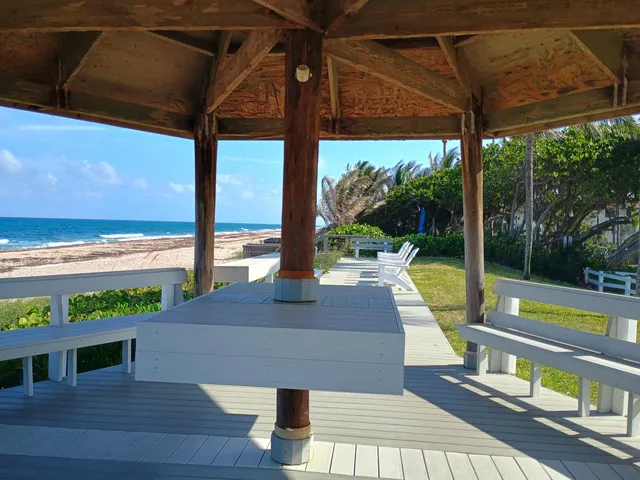 a view of a swimming pool with a porch