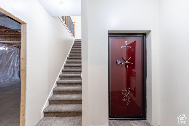 19502 South Olson Road Downey, ID 83234 - Photo 31 of 64 Stairway featuring carpet flooring and safe room.