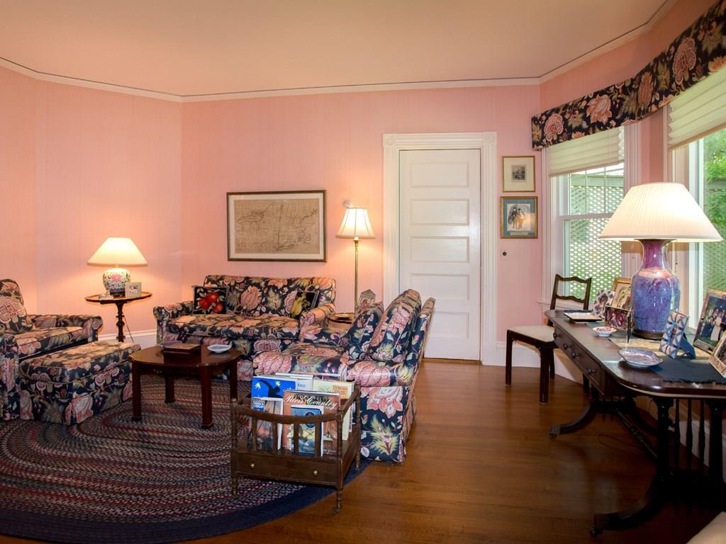 26 Manchester Road Northeast Harbor, ME 04662 - Photo 8 of 35 Parlor with fireplace. Door to Pantry