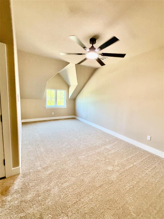 114 Ridgeline Drive Chico, TX 76431 - Photo 16 of 23 en empty room with windows and ceiling fan