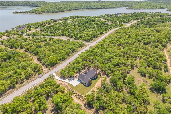a view of a yard with wooden floor