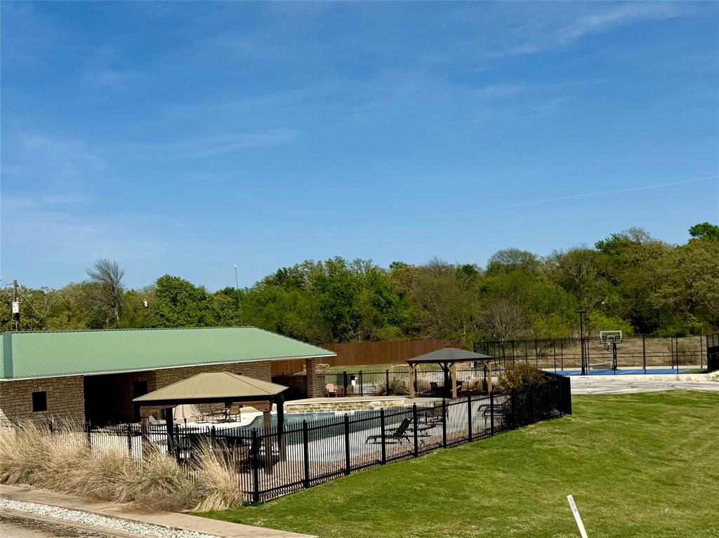 114 Ridgeline Drive Chico, TX 76431 - Photo 20 of 23 a view of a chairs and table on the terrace