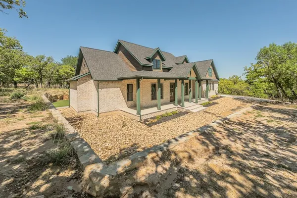 a view of a garden with a fountain