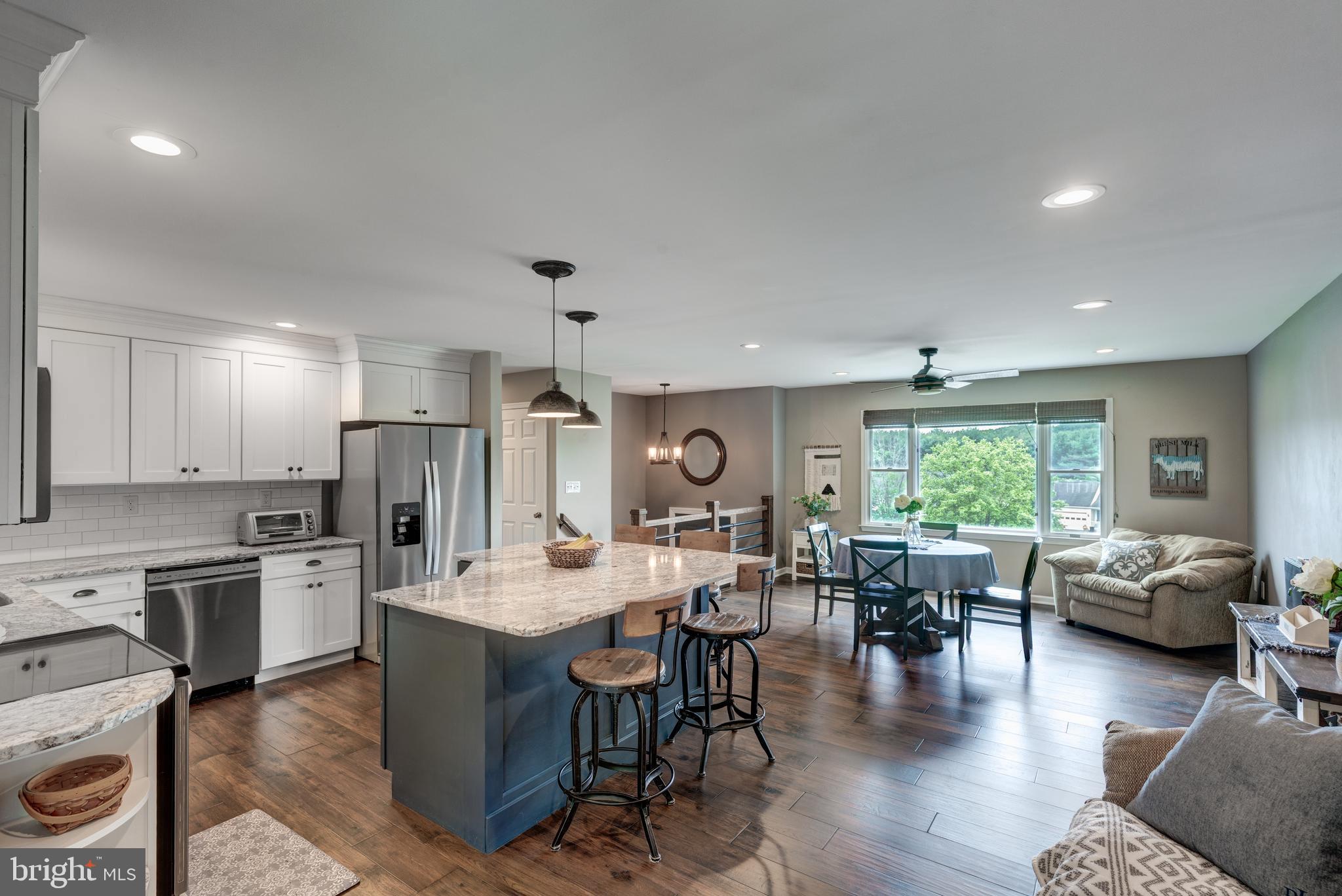 312 Inverness Close Westminster, MD 21158 - Photo 3 of 36 a large kitchen with a table and chairs