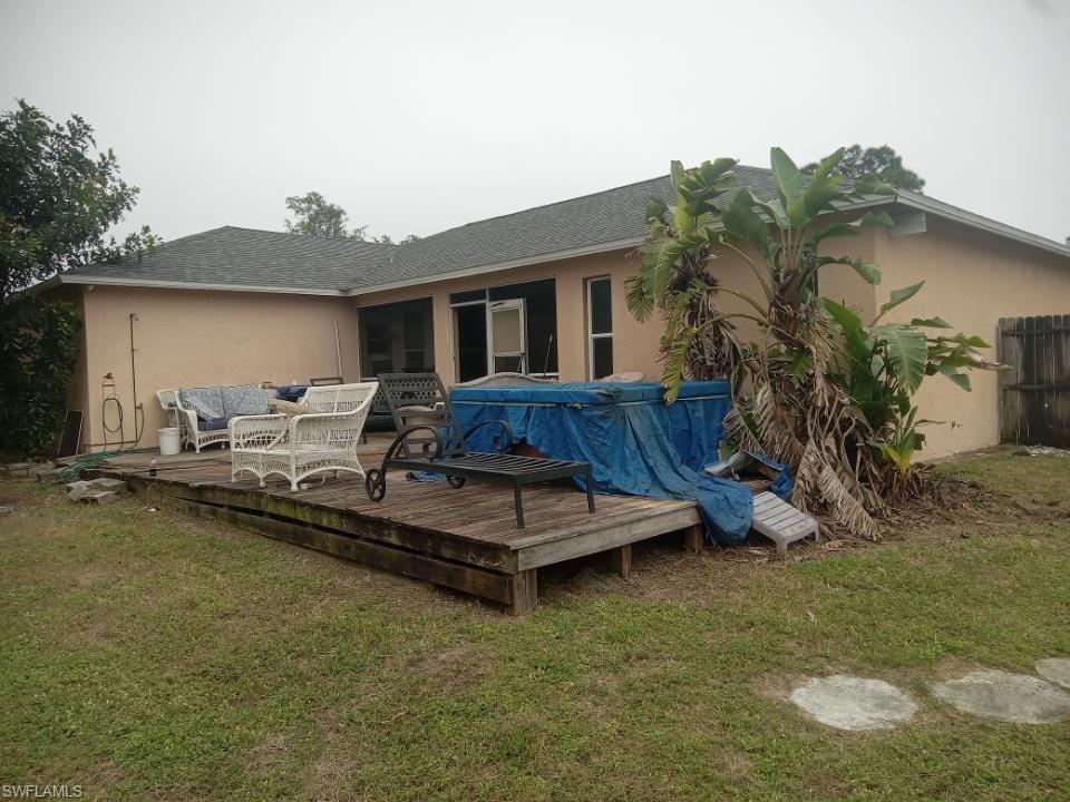 8213 Albatross Road Fort Myers, FL 33967 - Photo 16 of 17 a view of a house with pool table and chairs