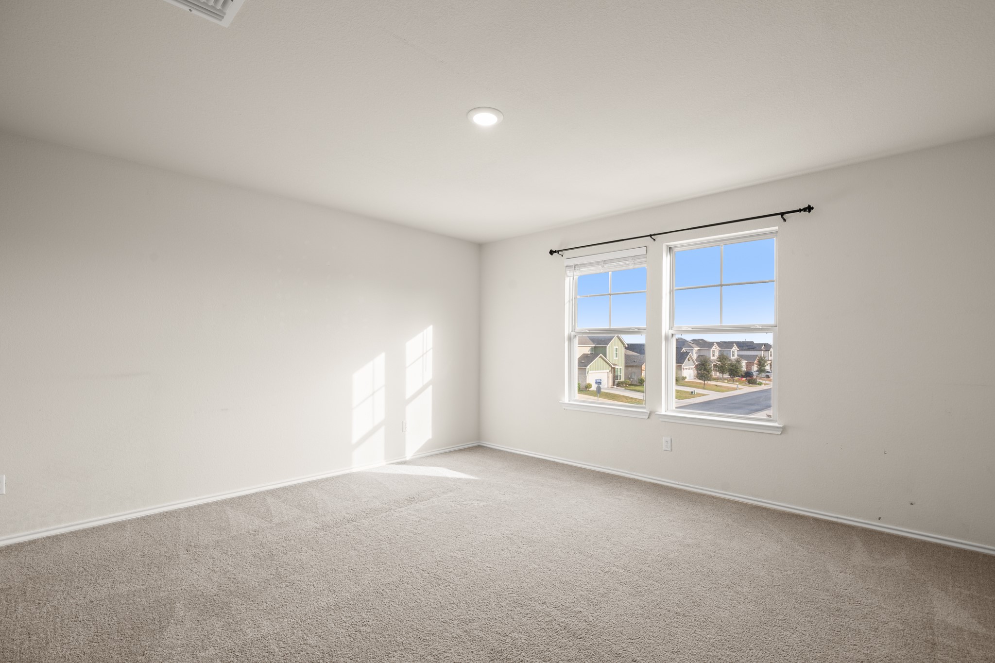2300 Cliffbrake Way Georgetown, TX 78626 - Photo 13 of 28 a view of an empty room with a window