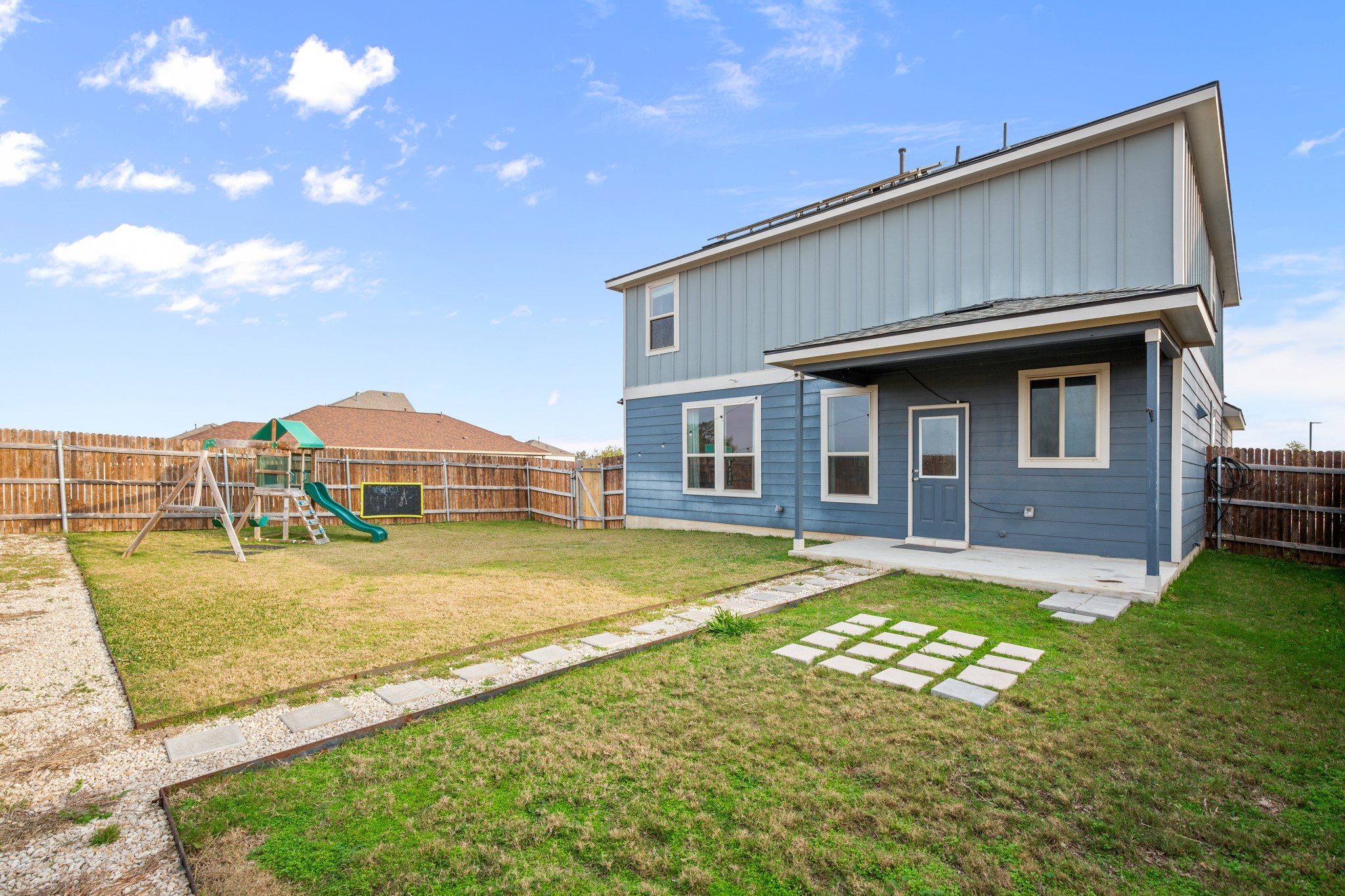 2300 Cliffbrake Way Georgetown, TX 78626 - Photo 26 of 28 a swimming pool with yard in front of it