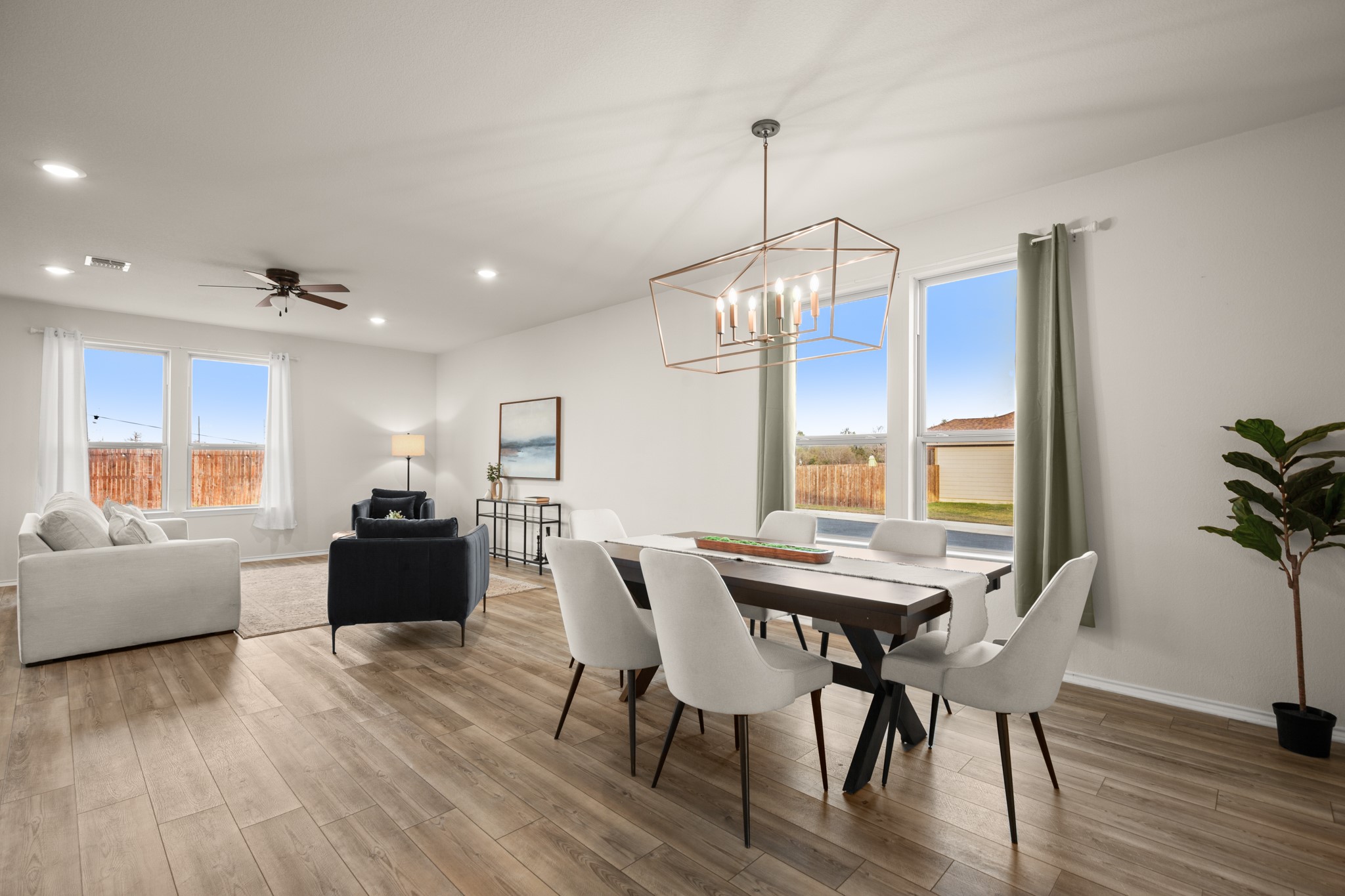 2300 Cliffbrake Way Georgetown, TX 78626 - Photo 7 of 28 a view of a dining room with furniture window and wooden floor