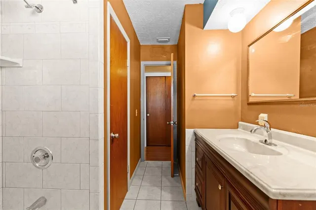 a bathroom with a shower and a bathtub