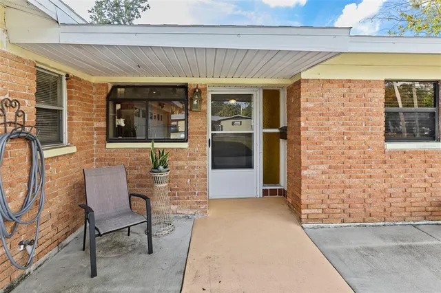 a view of a house with a swimming pool