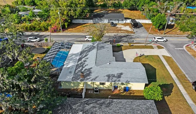 an aerial view of a yard with outdoor seating