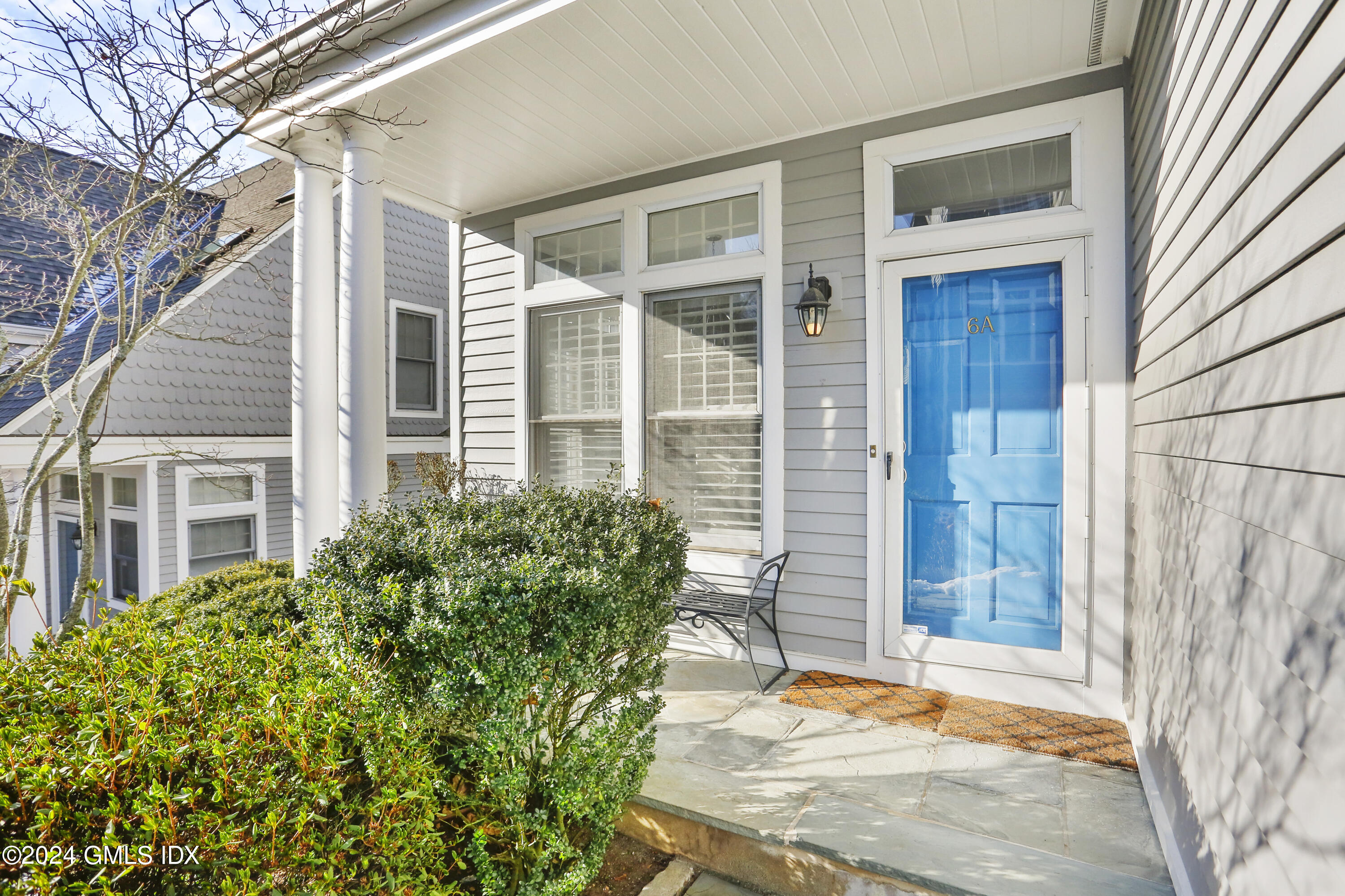 186 Field Point Road, Unit 6A Greenwich, CT 06830 - Photo 2 of 32 a view of a house with a backyard