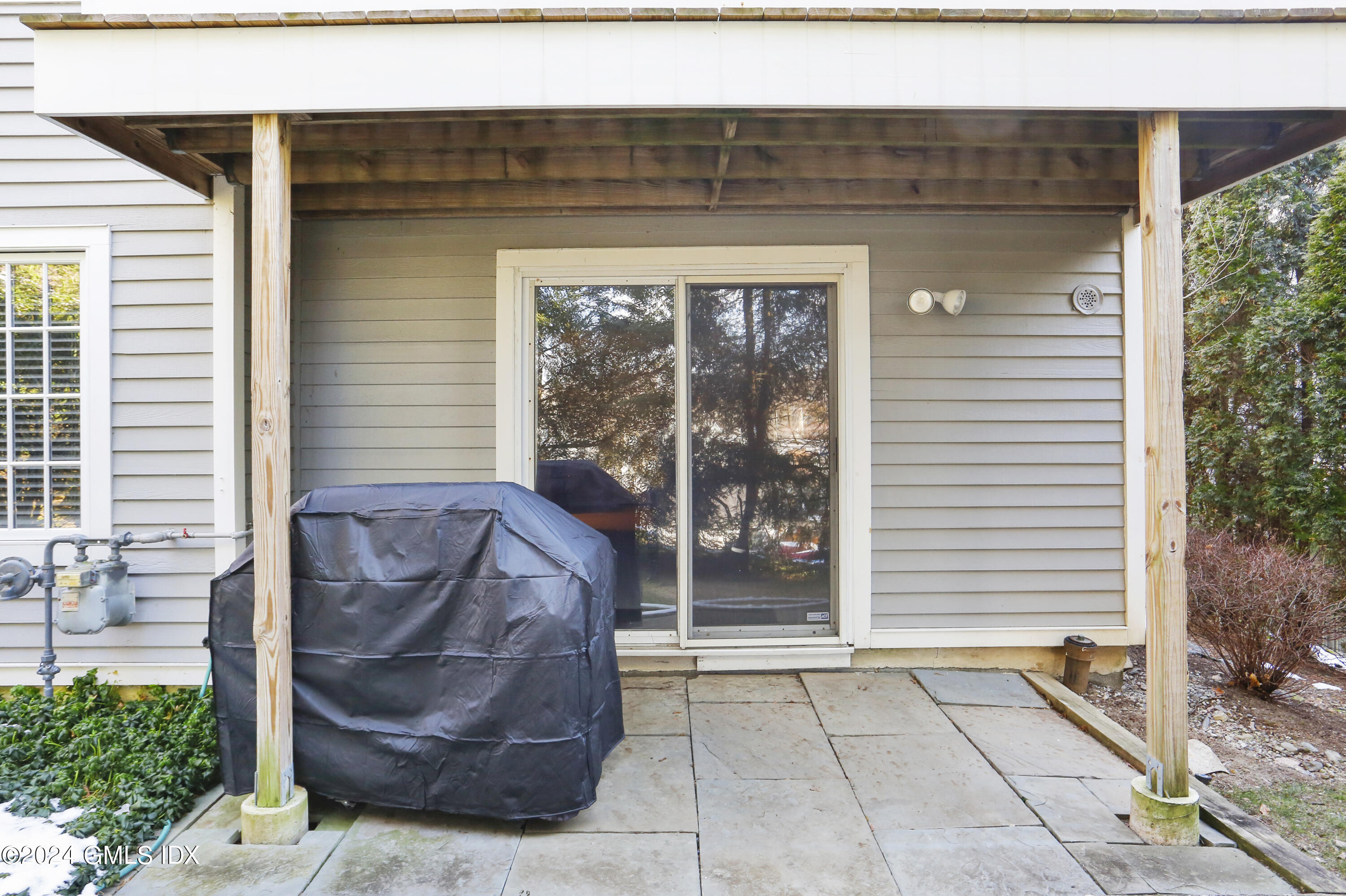 186 Field Point Road, Unit 6A Greenwich, CT 06830 - Photo 26 of 32 a view of entryway with a garden