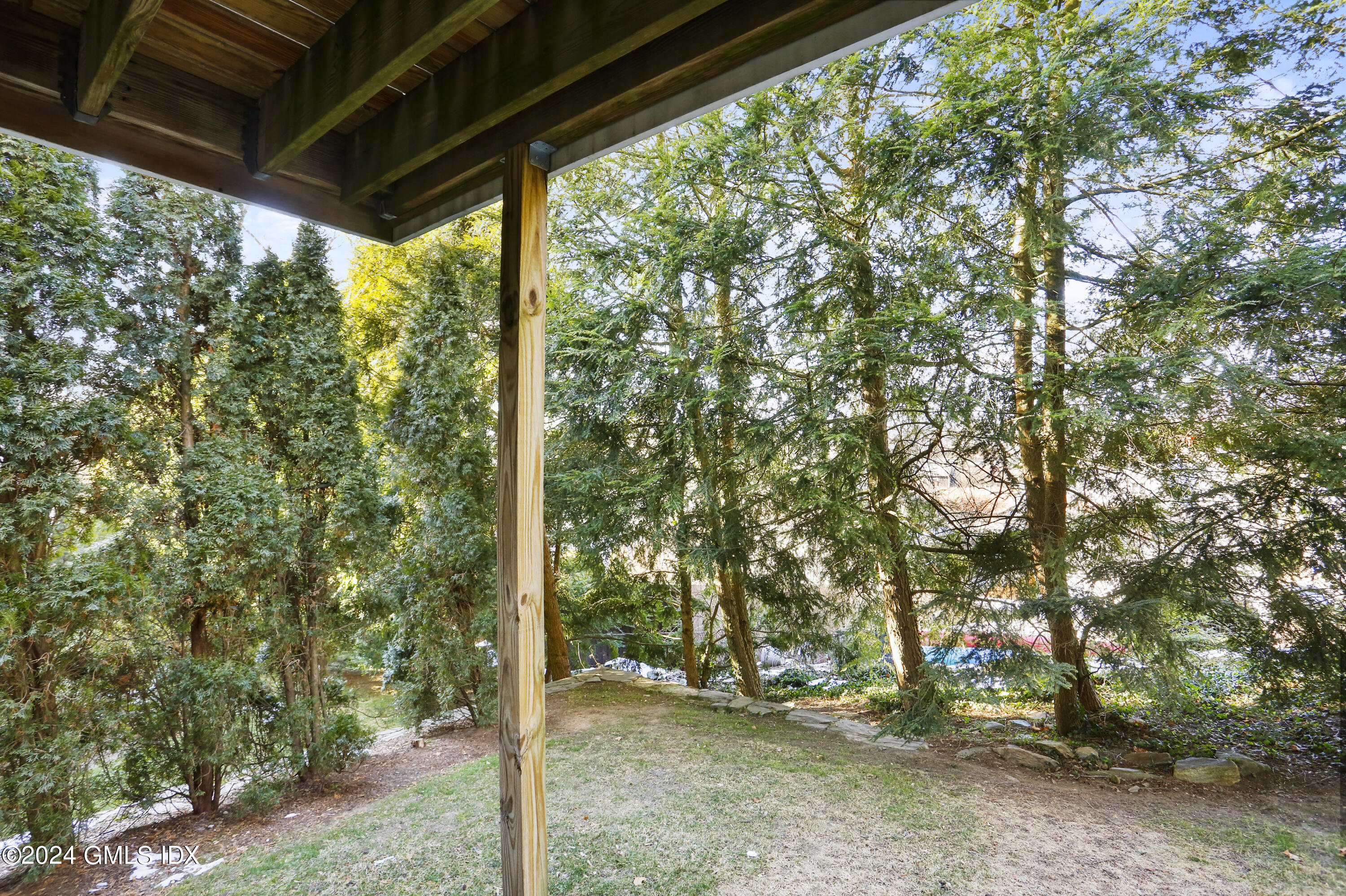 186 Field Point Road, Unit 6A Greenwich, CT 06830 - Photo 27 of 32 a view of a room with a tree