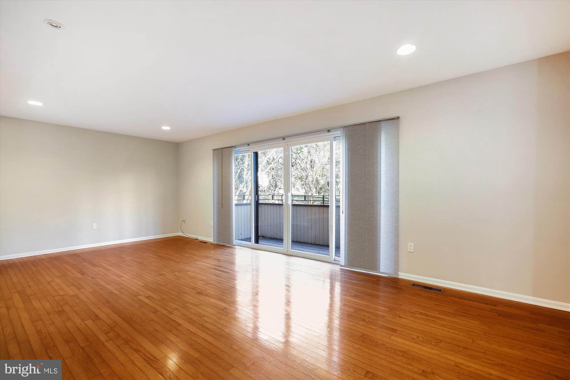 11042 Saffold Way Reston, VA 20190 - Photo 11 of 50 LIV RM with hdwd floor and walkout to balcony