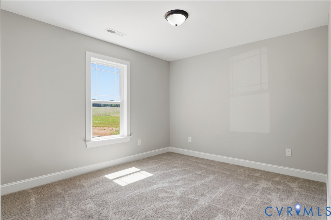 17557 Hewlett Road Beaverdam, VA 23015 - Photo 13 of 29 an empty room with a window