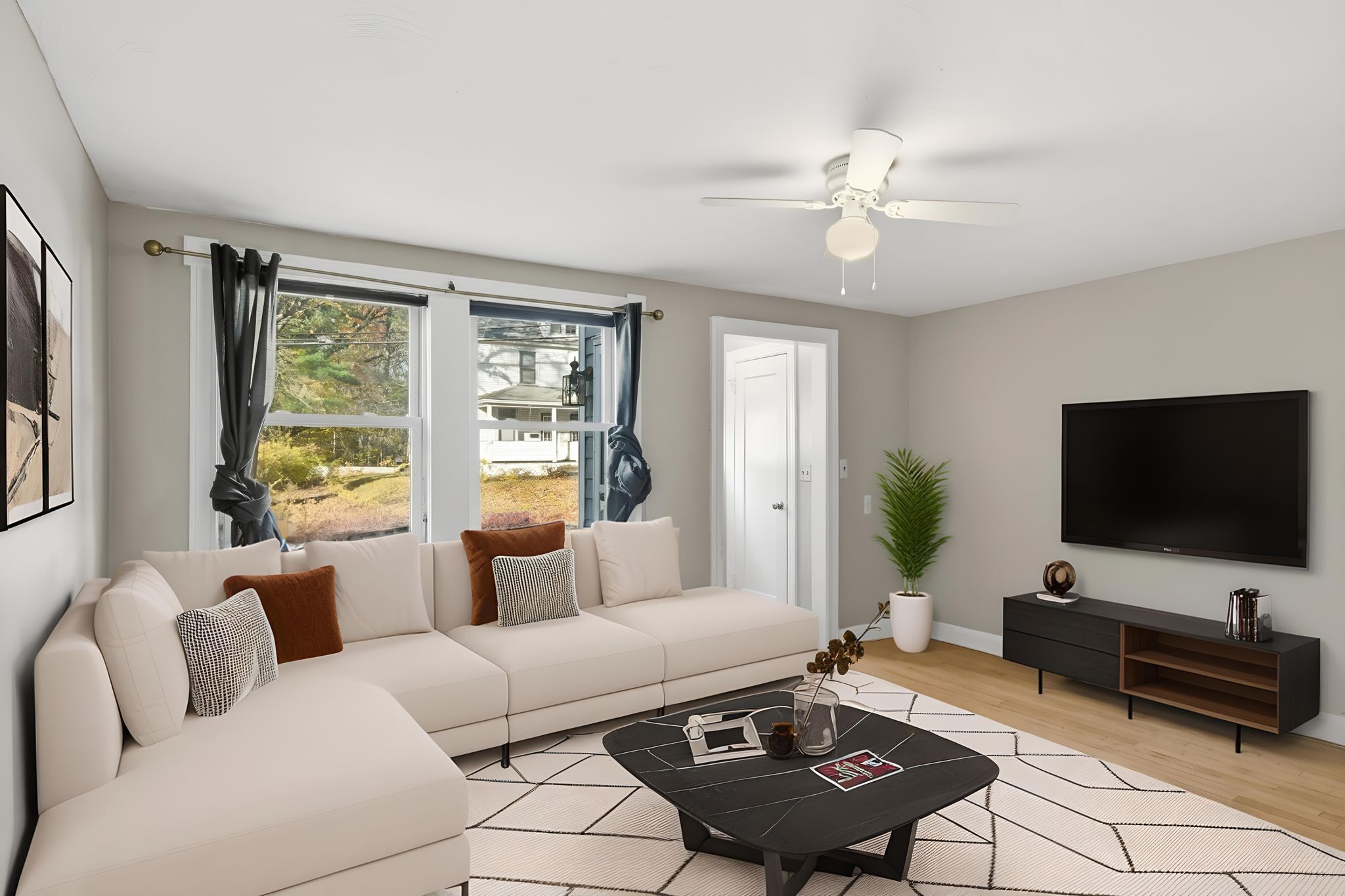 80 Hemlock Street Manchester, CT 06040 - Photo 1 of 32 a living room with furniture and a flat screen tv