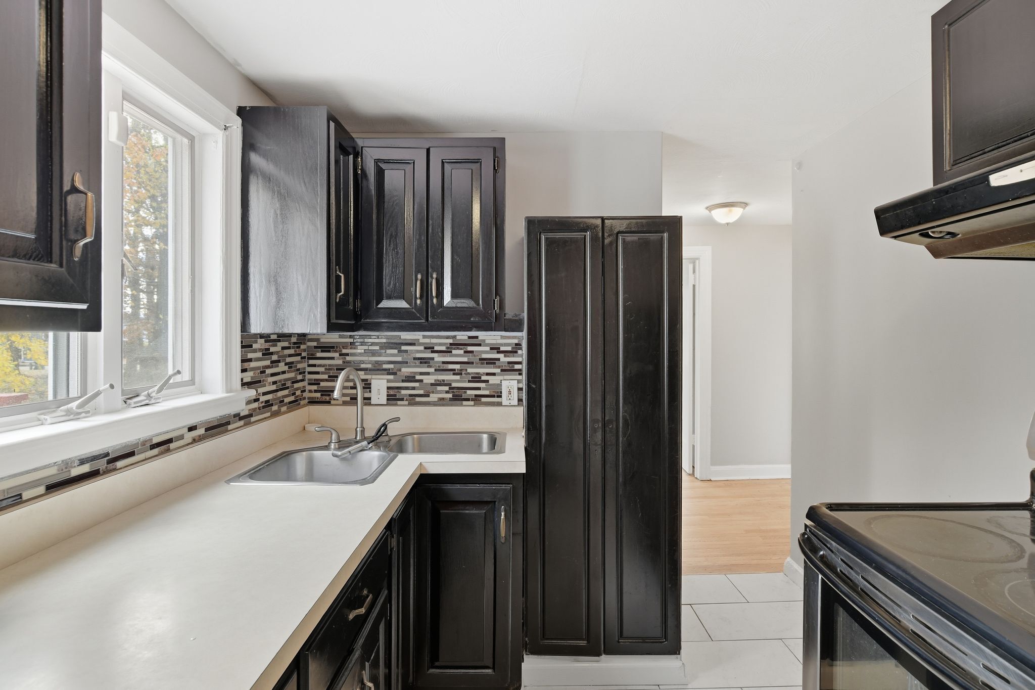 80 Hemlock Street Manchester, CT 06040 - Photo 13 of 32 a bathroom with a sink and a mirror