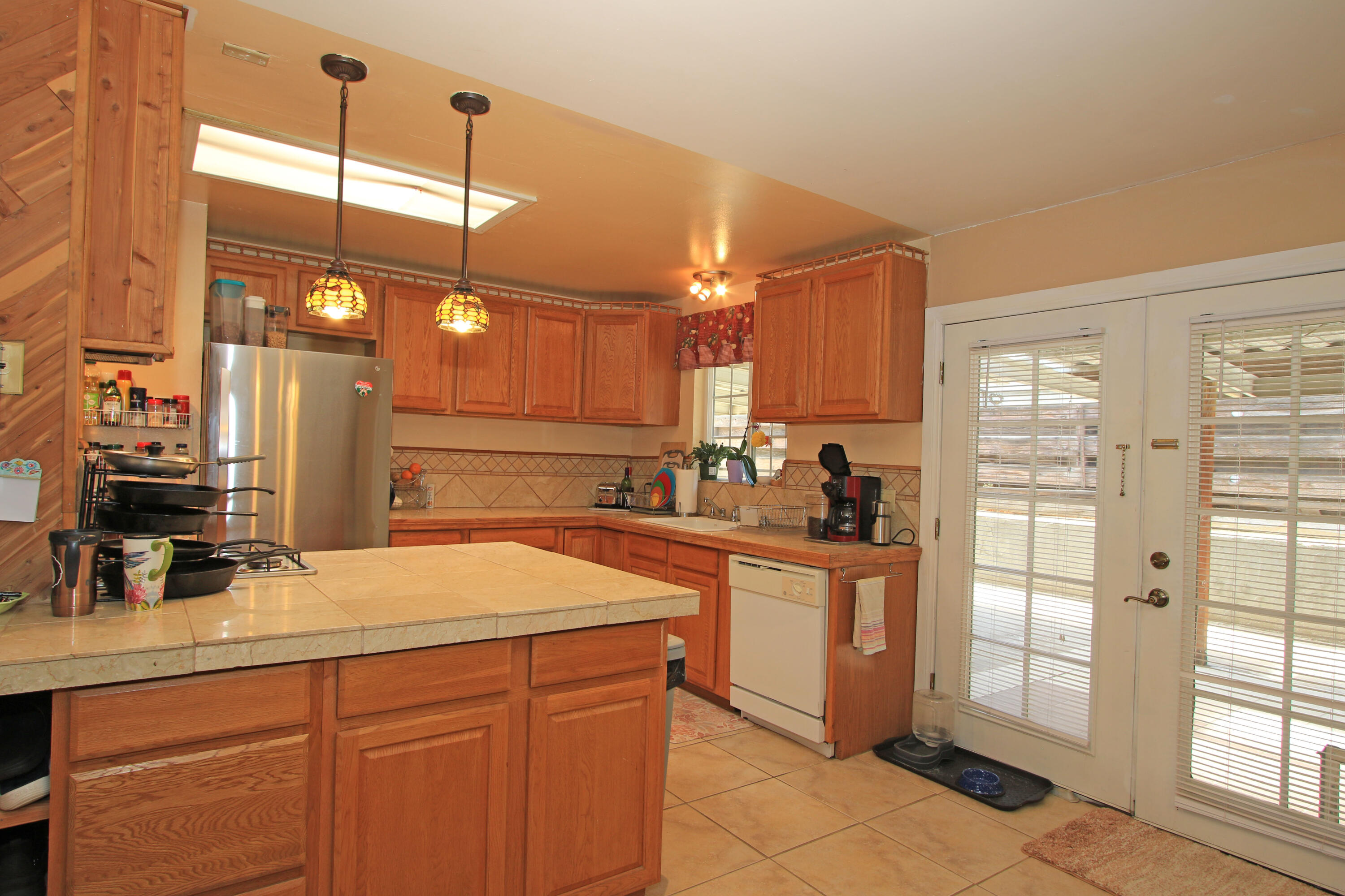 68345 Terrace Road Cathedral City, CA 92234 - Photo 2 of 36 a kitchen with a sink and cabinets