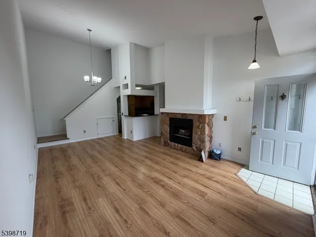 a view of a livingroom with a fireplace