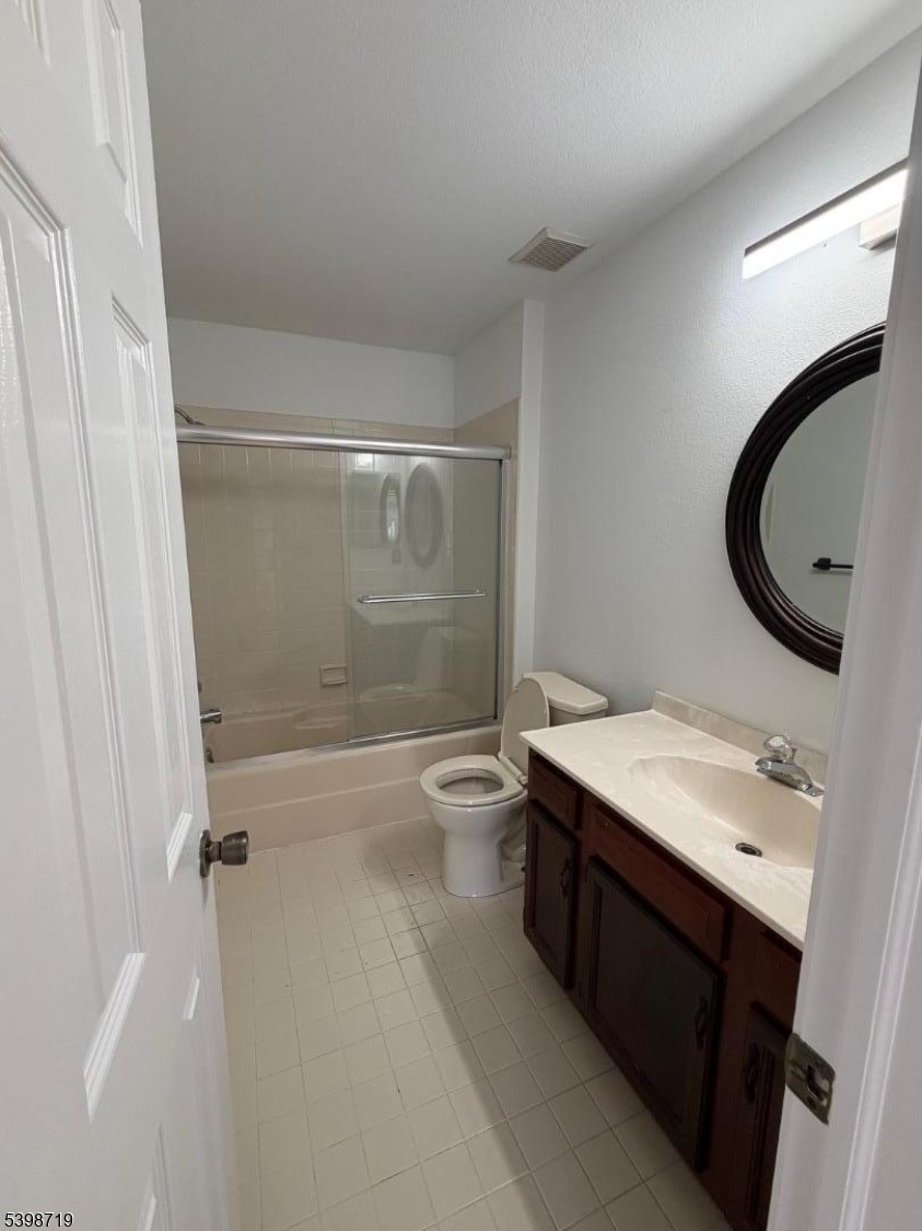 94 Wescott Road Bedminster, NJ 07921 - Photo 8 of 17 a bathroom with a sink a toilet and shower