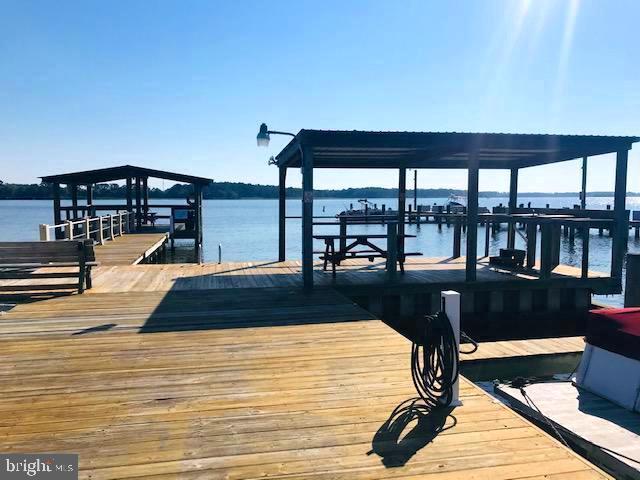 389 Seahawk Lane Berlin, MD 21811 - Photo 35 of 42 Pier and fish cleaning station.