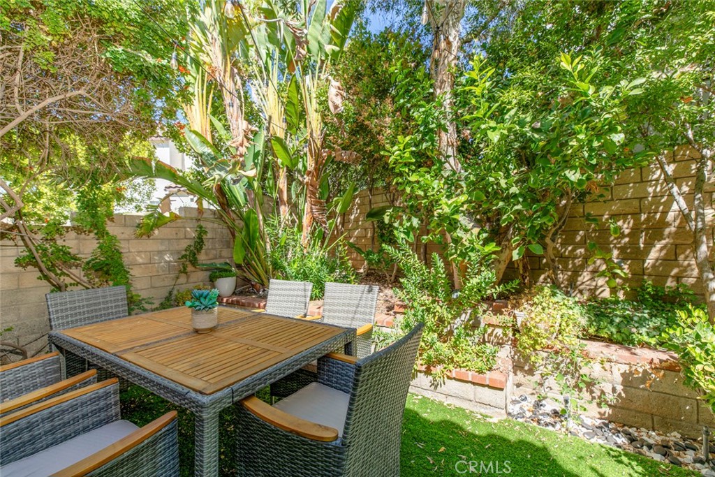 23301 Montecito Place Valencia, CA 91354 - Photo 30 of 45 a view of a patio with table and chairs and couches