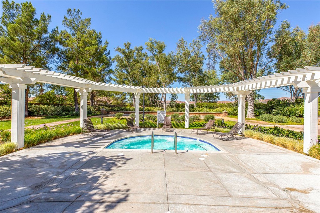 23301 Montecito Place Valencia, CA 91354 - Photo 36 of 45 a view of a swimming pool with a patio