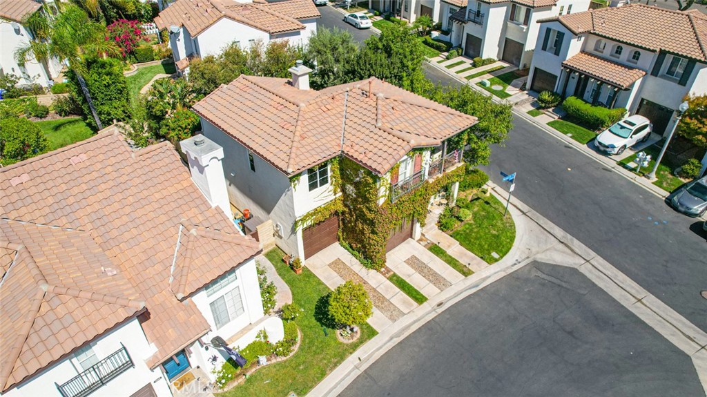 23301 Montecito Place Valencia, CA 91354 - Photo 39 of 45 an aerial view of multiple houses with yard