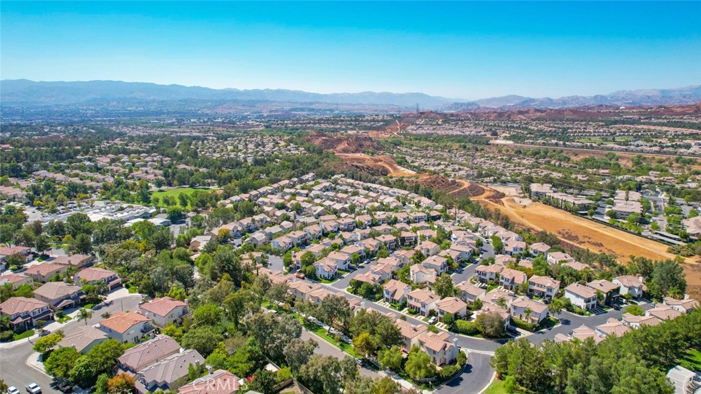 23301 Montecito Place Valencia, CA 91354 - Photo 43 of 45 a view of a city with mountains in the background