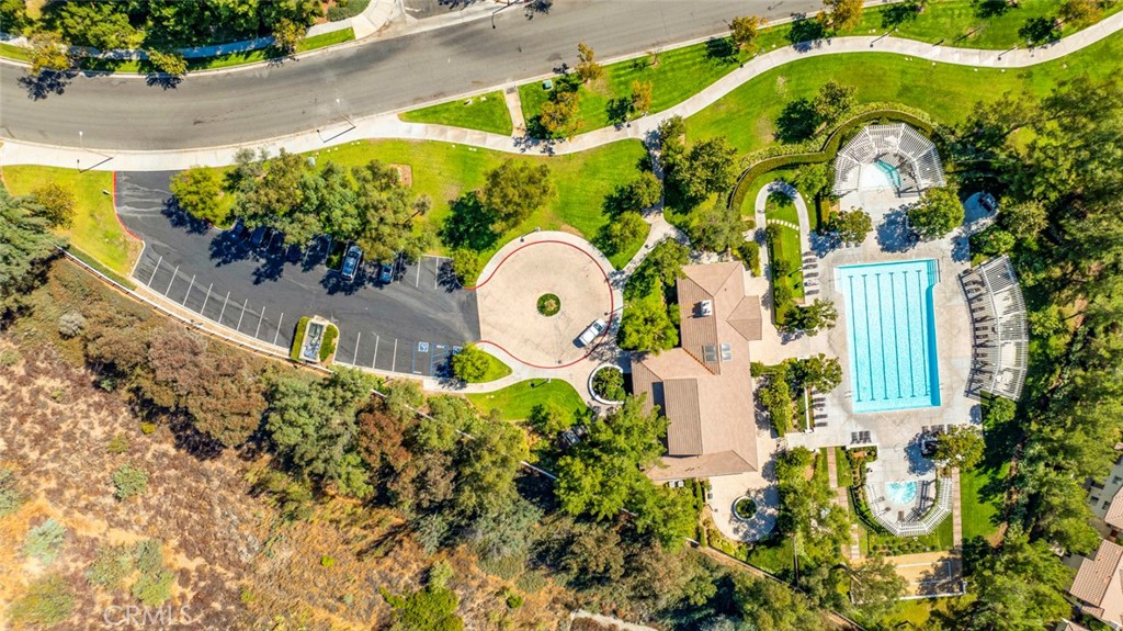 23301 Montecito Place Valencia, CA 91354 - Photo 45 of 45 a aerial view of a house with a pool and large trees