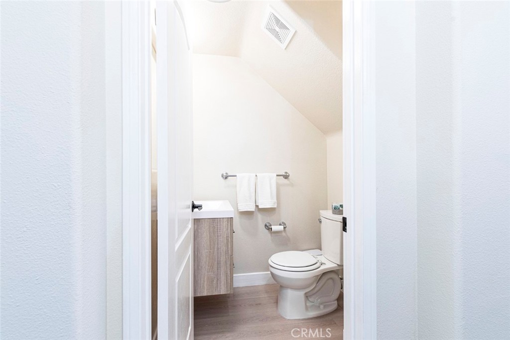 23301 Montecito Place Valencia, CA 91354 - Photo 7 of 45 a bathroom with a toilet and a sink